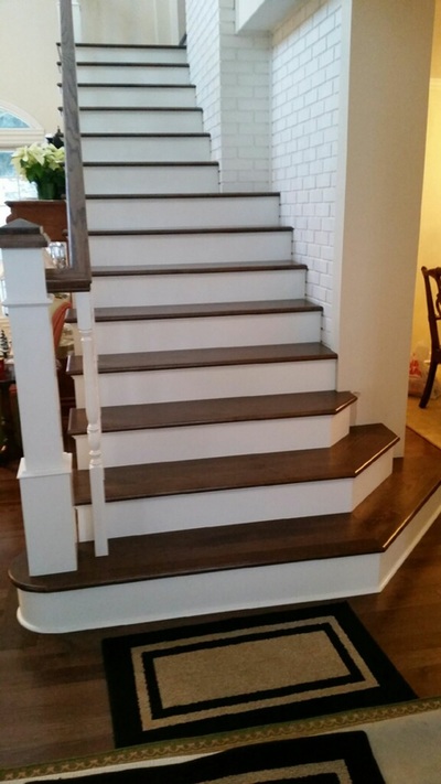 Steps with stained hickory and painted risers in South Fargo.